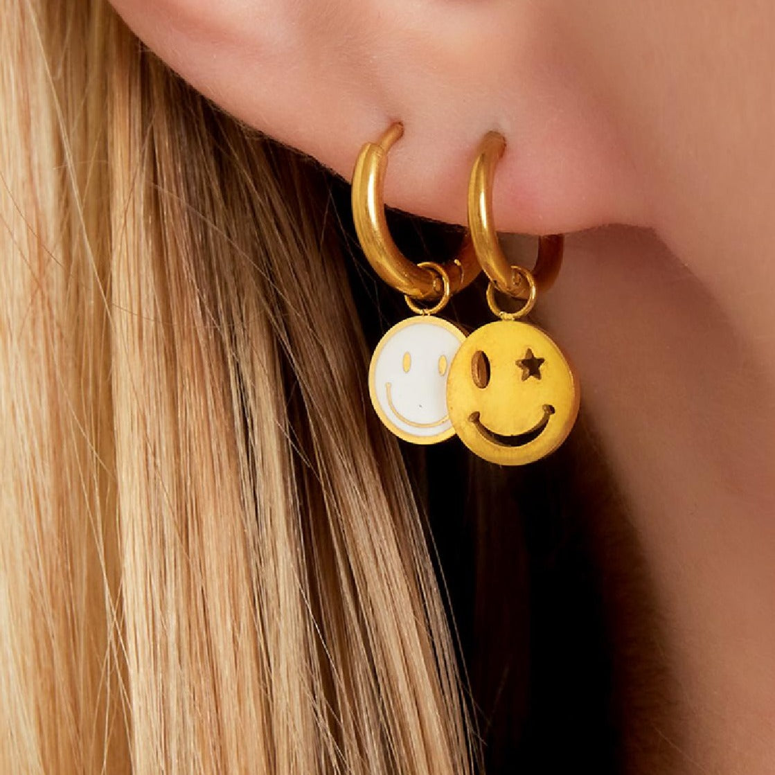 Oorbel smiley en ster